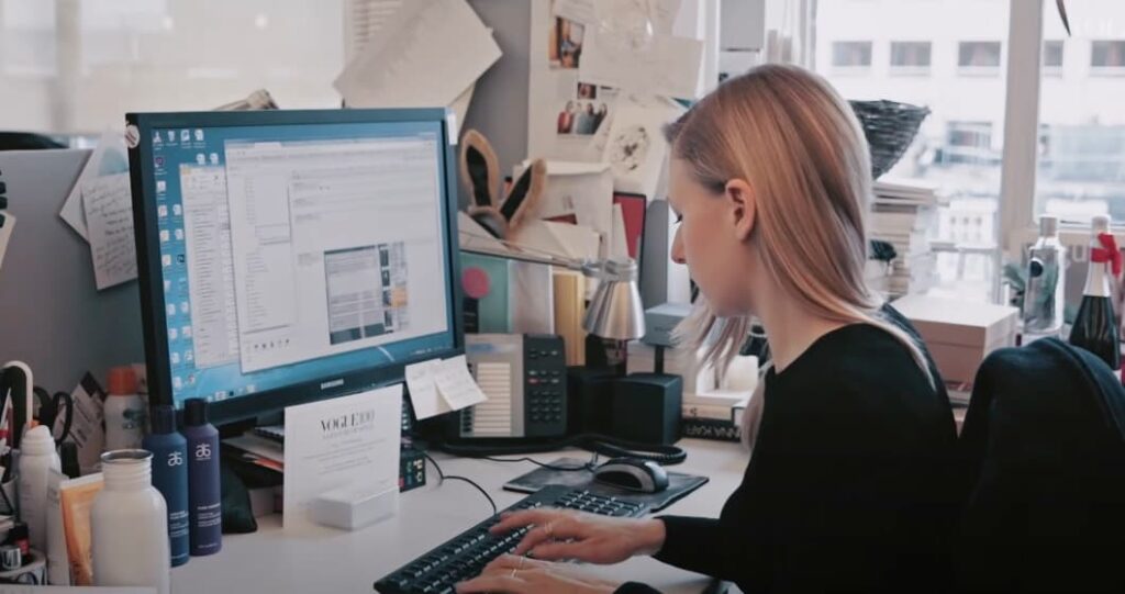 Female working on a computer in a Vogue office