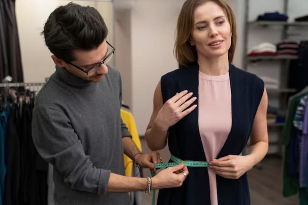 Stylist measuring waist on client