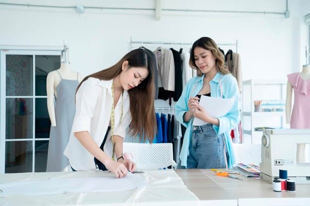 Fashion designer collaborating with an intern