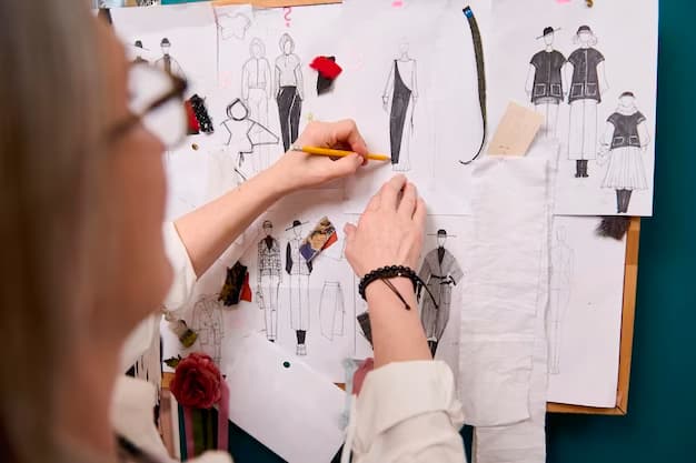 Hand designing fashion on a pegboard