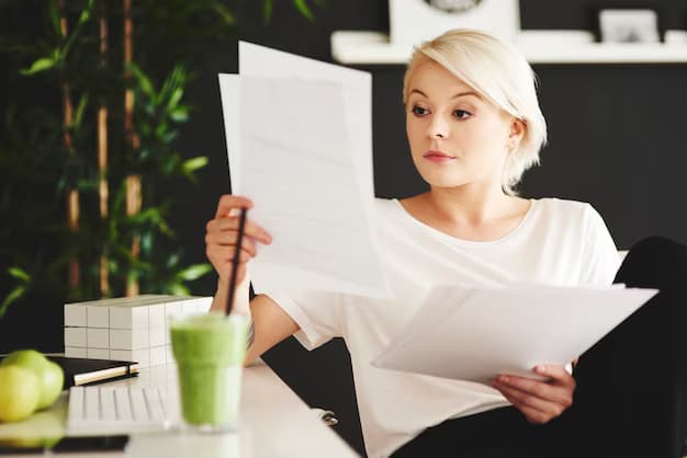 Woman reading documents in her office